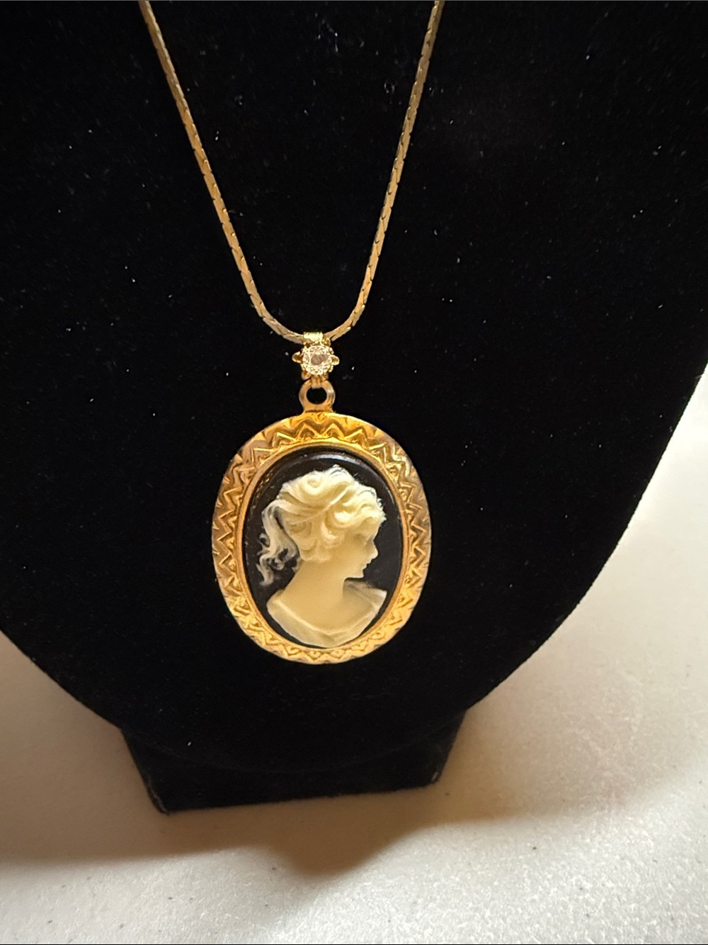 Goldtone Cameo Pendant Necklace - Black and Cream